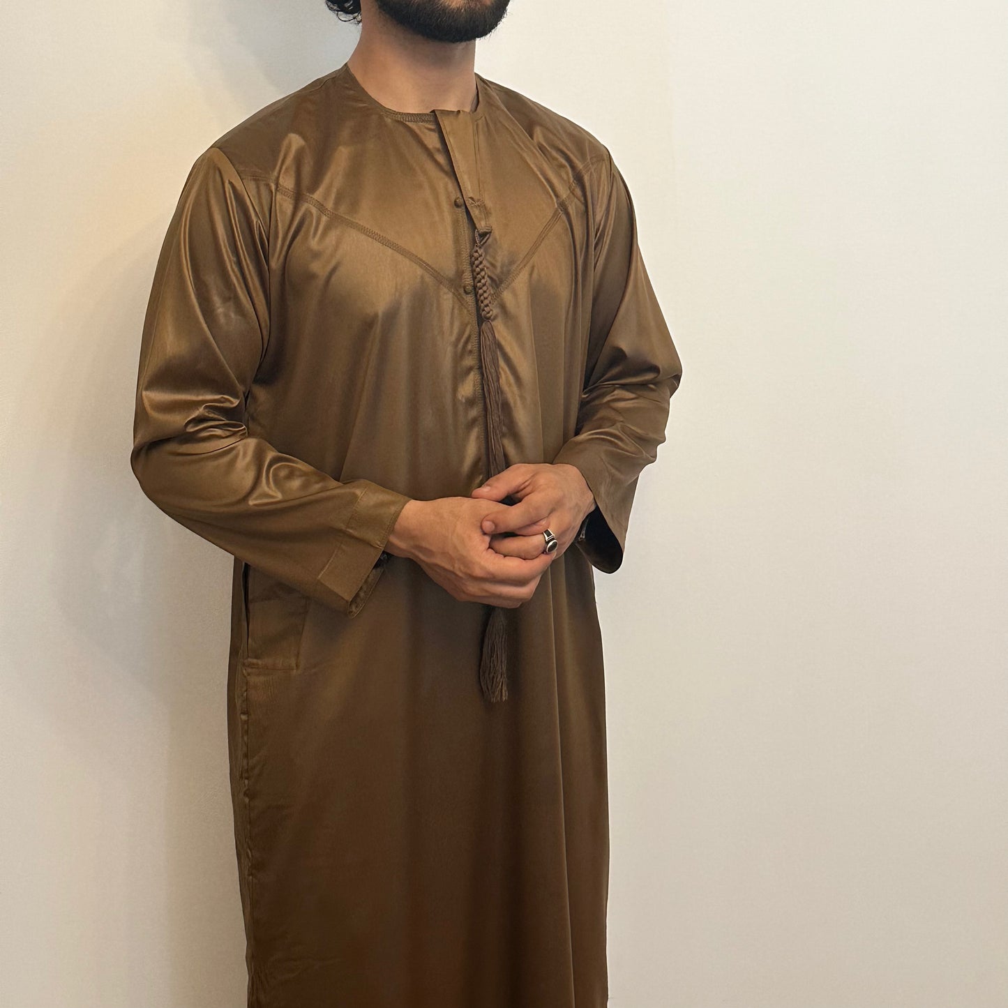 Brown silky Emirati thobe with detachable tassel