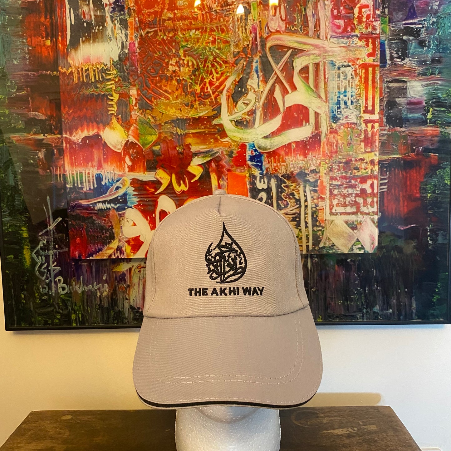 Grey baseball cap with black embroidery