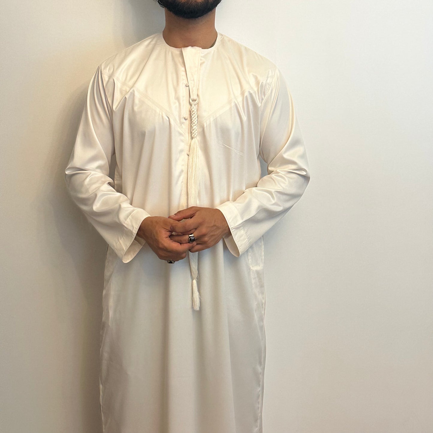 Cream silky Emirati thobe with detachable tassel