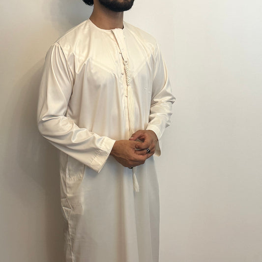 Cream silky Emirati thobe with detachable tassel