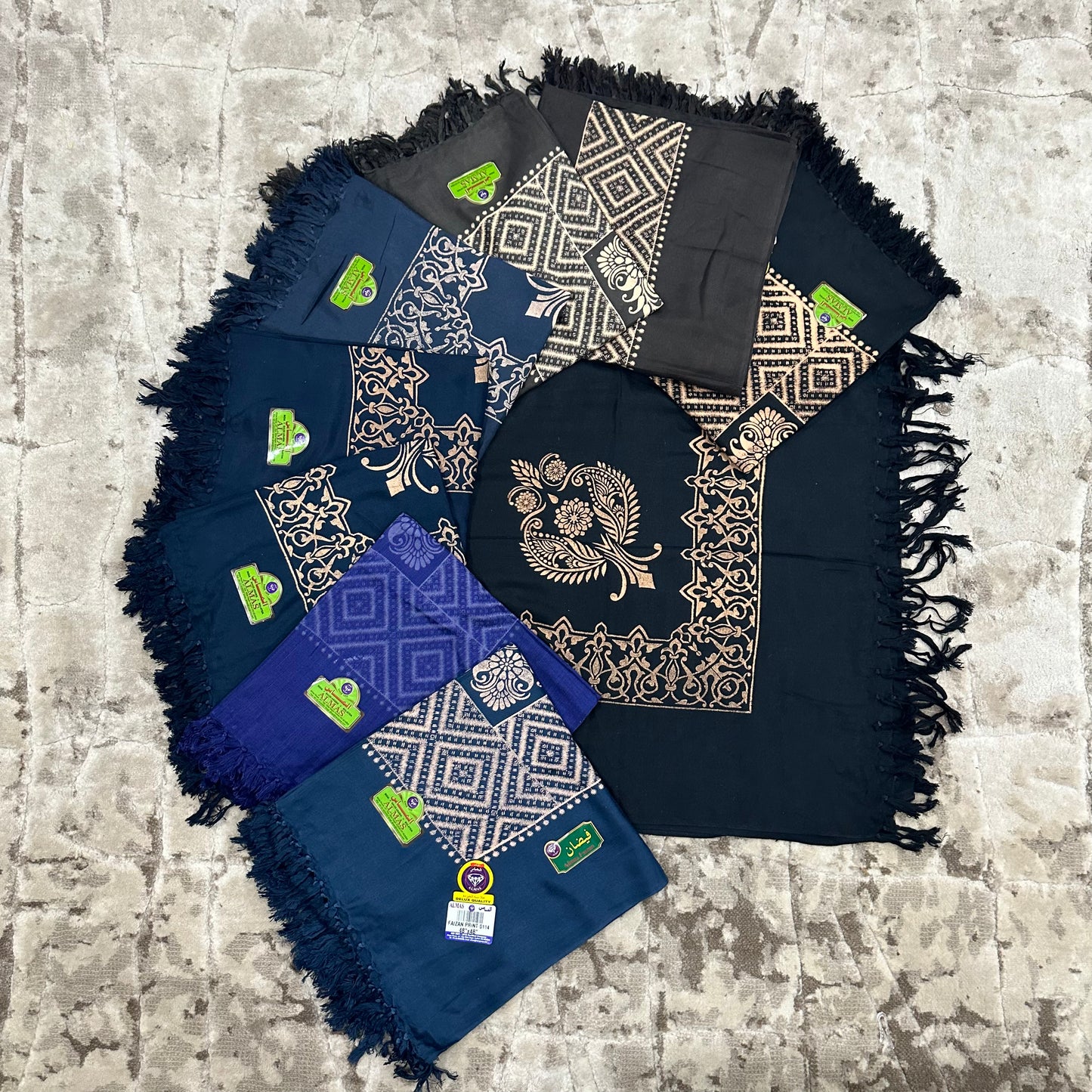 A collection of designer shemaghs in blue and black variants