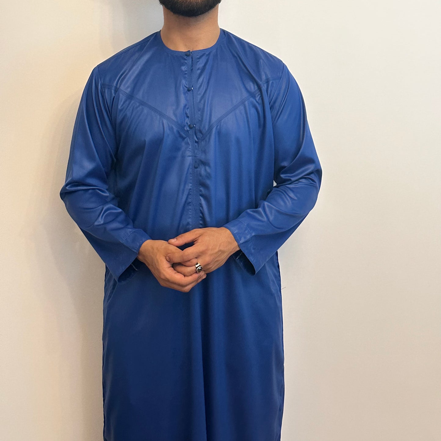 Blue silky Emirati thobe with detachable tassel