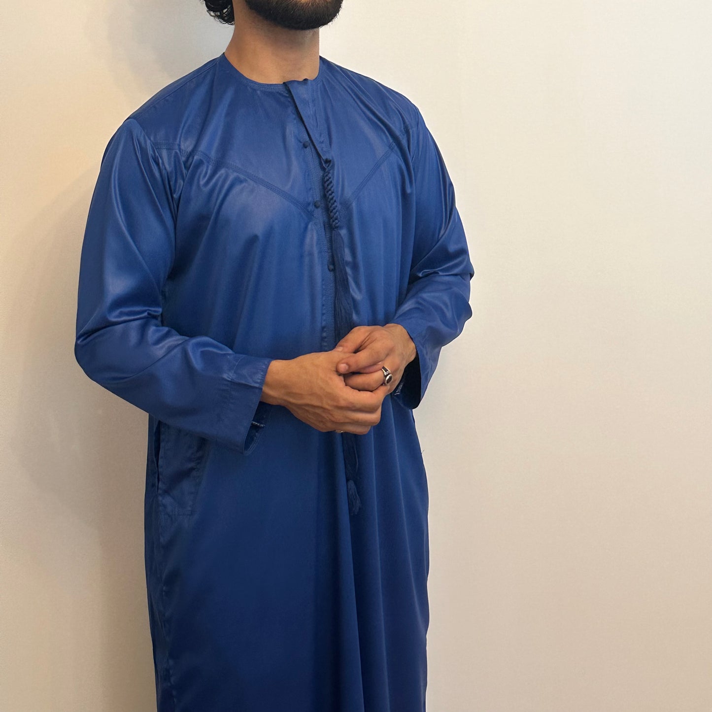 Blue silky Emirati thobe with detachable tassel